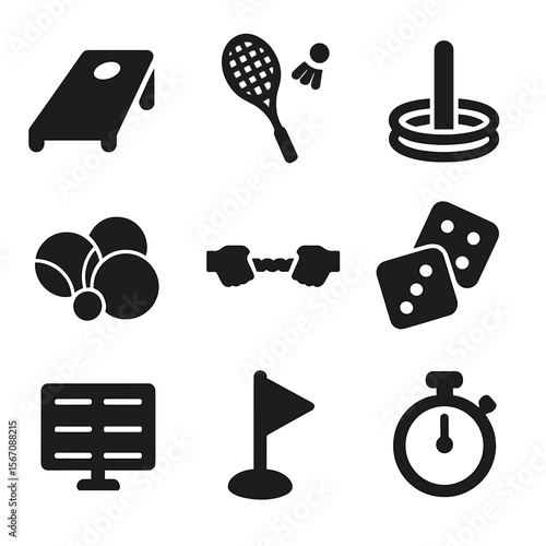 Family Yard Games Icons. Solid, filled icons set of family yard games: cornhole board, badminton racket, ring