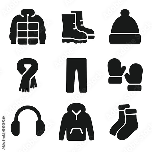 Winter Wardrobe Icons. Solid, filled icon set of winter wardrobe items: puffer jacket, snow boots, beanie, thick scarf, thermal