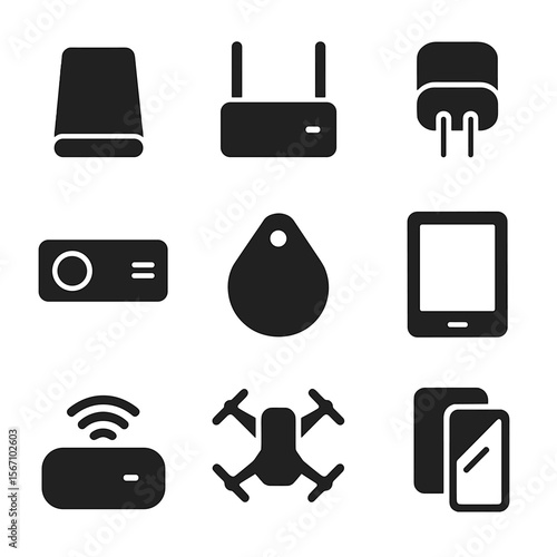 Portable Tech Icons. Solid, filled icons set of portable tech in minimalist design: slim power bank, compact