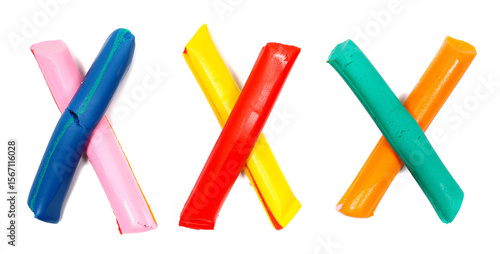 clay modelling in shape thrice x, colorful plasticine isolated on white