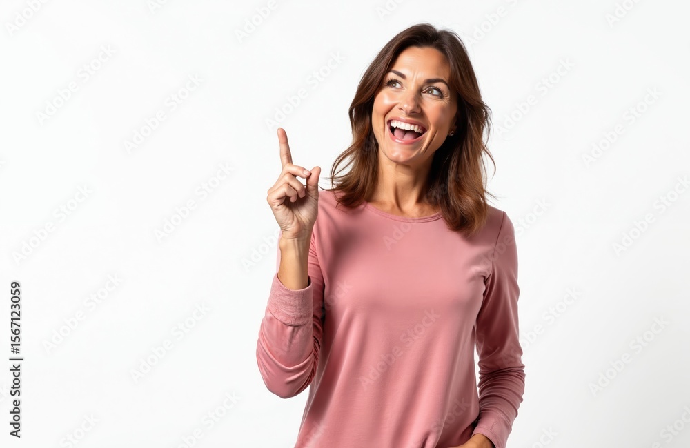 Middle-aged caucasian woman isolated on white background. Woman points index finger upwards. Attractive lady smiling, looking at idea above her. Concept of an idea. Woman happy to have great idea. Middle-aged caucasian woman isolated on white background. Woman points index finger upwards. Attractive lady smiling, looking at idea above her. Concept of an idea. Woman happy to have great idea.