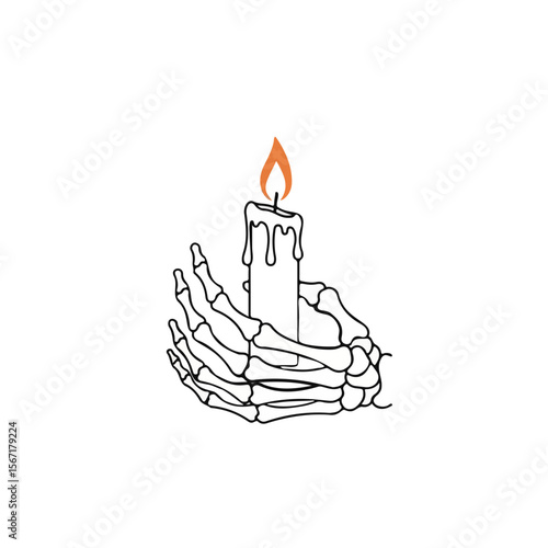 Skeleton hand holding candle with flame as Halloween decoration  