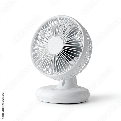 Compact white desk fan providing cool air in a modern workspace with a minimalistic design