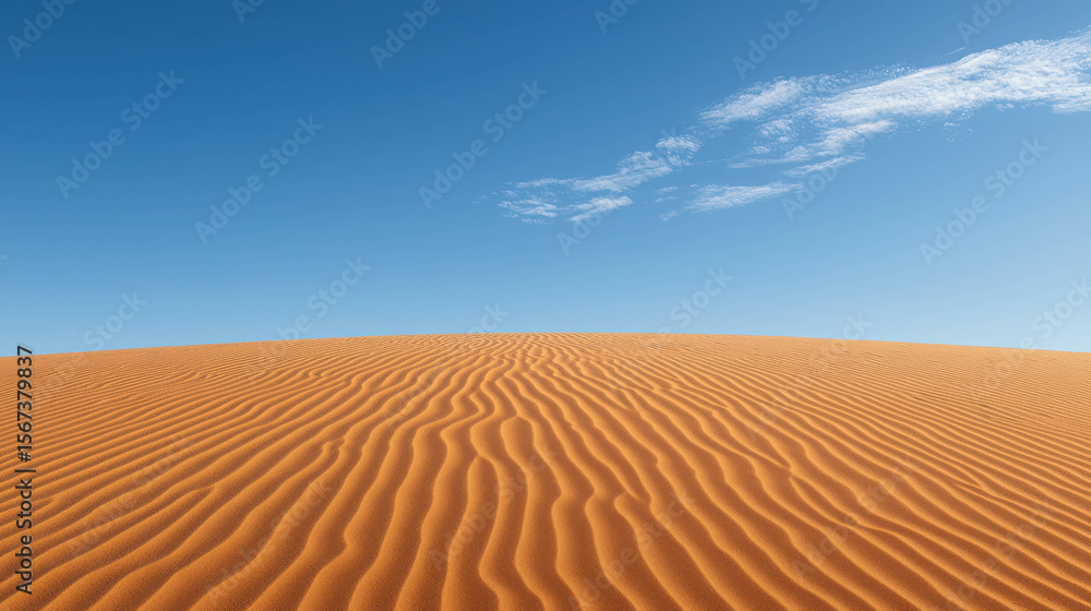 Fototapeta premium Expansive Sand Dunes under Clear Blue Sky with Subtle White Clouds and Textured Patterns on Golden Sands in an Arid Desert Landscape