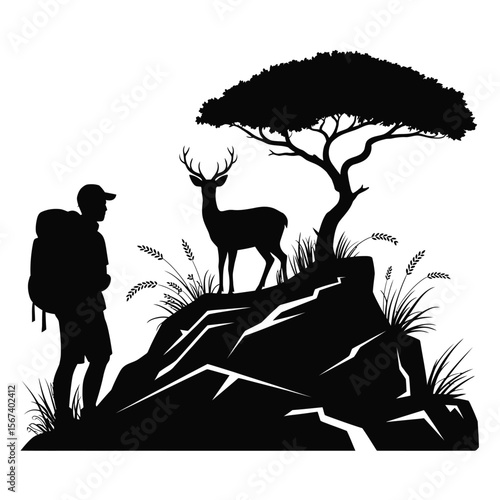 Silhouette of a hiker encountering a deer under a tree on a rocky outcrop