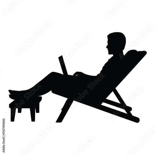 Silhouette of a person relaxing in a lounge chair using a laptop computer