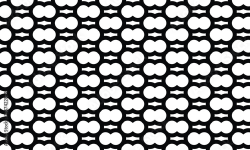 Black and white repeating pattern with interconnected, symmetrical shapes.