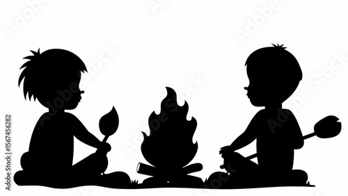 Two children sitting around a campfire in silhouette holding sticks and enjoying the warmth of the fire