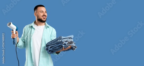 Young man with steamer and ...