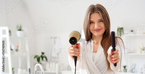 Beautiful young woman with ...