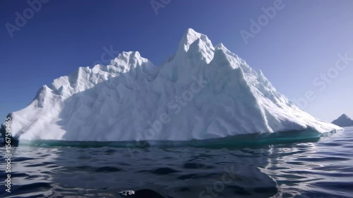 Wallpaper Mural Majestic iceberg movement transitions from above to below water Torontodigital.ca