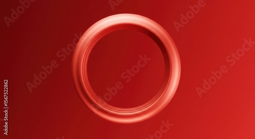 A vibrant, smooth, and glossy red ring floats against a gradient red backdrop, creating depth