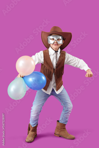 Funny little boy in cowboy ...