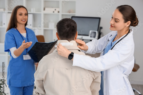Female doctor putting cervi...
