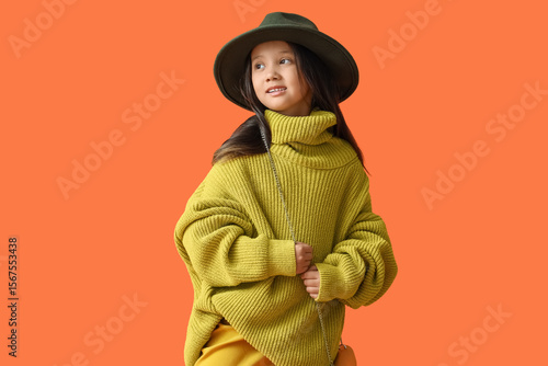 Cute little Asian girl in a...
