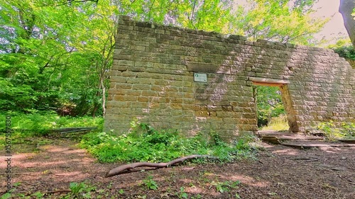 The ruins of the industrial cotton mill on the bank of the Bentley Brook in Lumsdale in the Derbyshire Peak District
