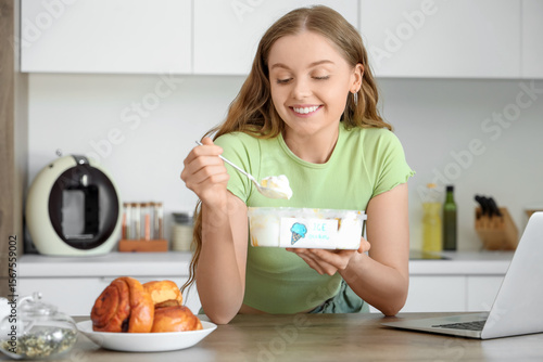 Young woman with ice cream ...