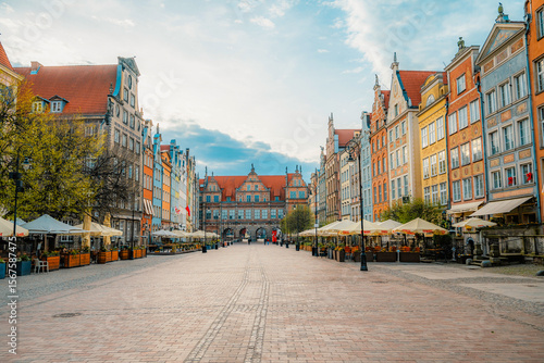 Gdansk with Motlawa river in Poland. Old town colourful house with saint Marys church i main square.