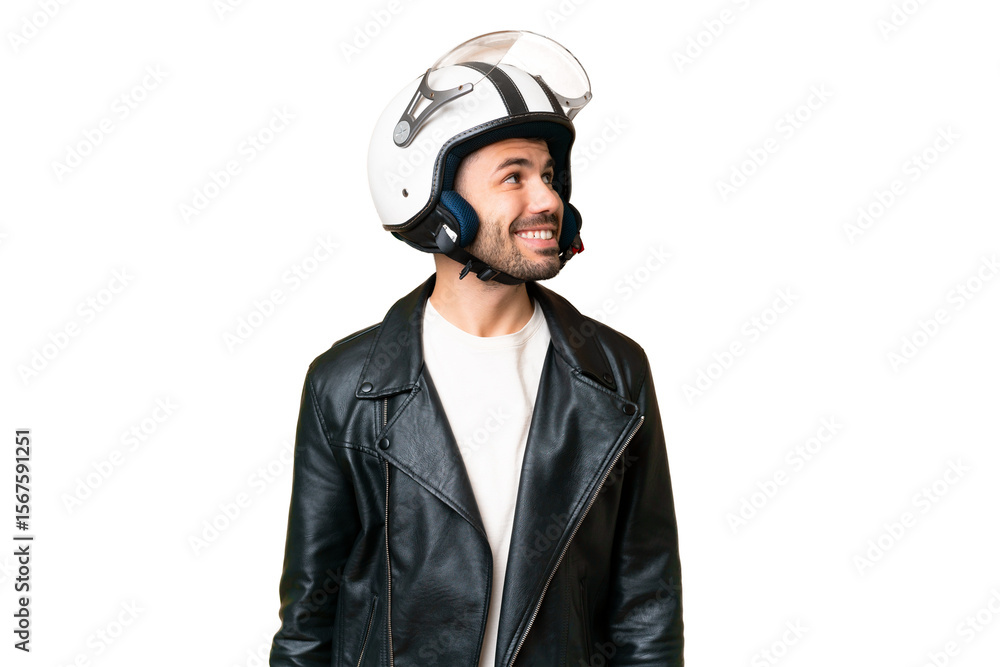 Young caucasian man with a motorcycle helmet over isolated chroma key background looking to the side and smiling Young caucasian man with a motorcycle helmet over isolated chroma key background looking to the side and smiling