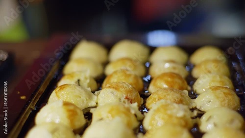 Thai Coconut Pancakes Cooking on Griddle � Street Food Close-Up