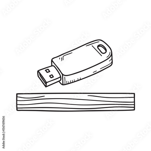 A USB drive with its cover off set on a wooden shelf