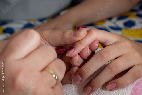 finger cosmetic manicure four hands polish white background 