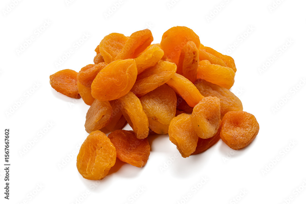 Dried apricots lie loosely stacked on a transparent background. The surface appears soft and fibrous. Dried apricots lie loosely stacked on a transparent background. The surface appears soft and fibrous.