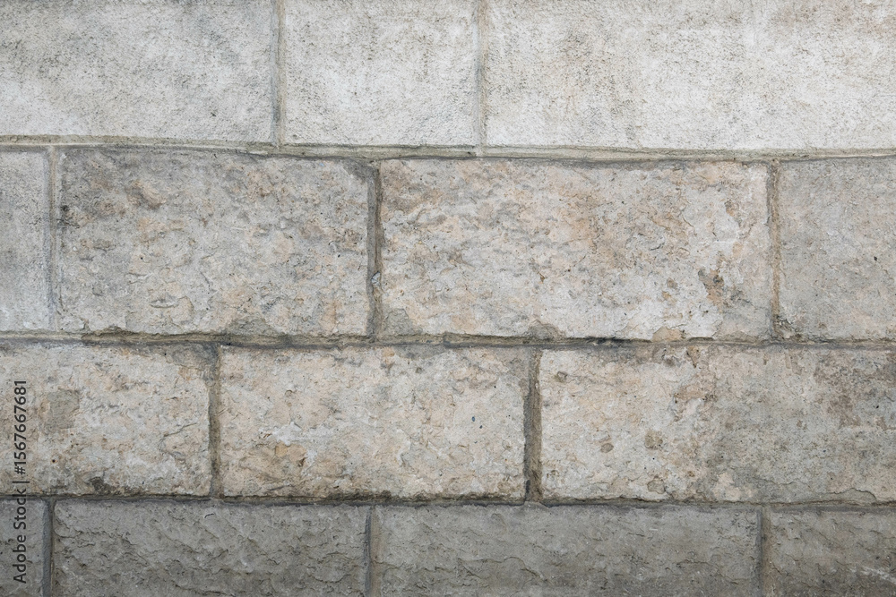 Fototapeta premium Vieux mur en pierre de taille calcaire