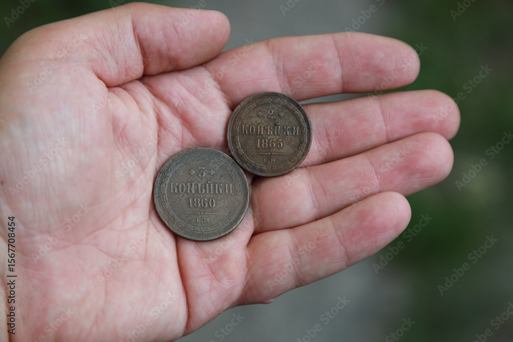 Rare old copper coins of Russian Empire in hand Rare old copper coins of Russian Empire in hand