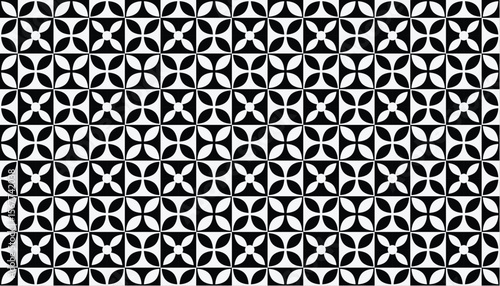 Modern tile design composed of quarter-circle elements arranged into stylized blooms