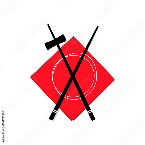 Sushi chopsticks crossed on a red red napkin