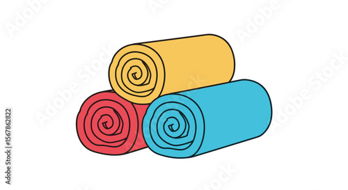 Three rolled towels stacked together showing red yellow and blue colors for spa or beach use