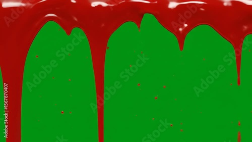 Glossy red liquid dripping from top on green screen, perfect for blood, paint, or sauce effects in video editing

