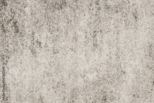 Rugged and gritty cement wall surface with a distressed texture