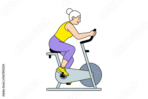 Senior Woman on Exercise Bike: An active senior woman engages in a low impact workout on an exercise bike, promoting senior fitness, indoor exercise, maintaining healthy and wellness