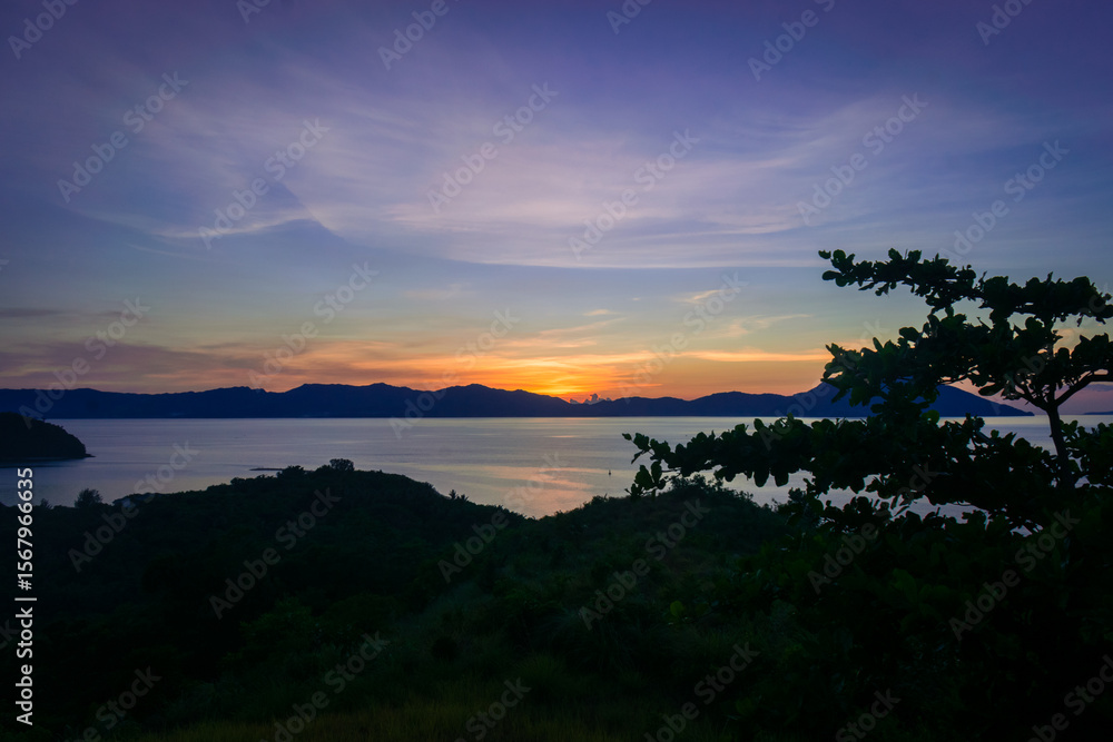 Naklejka premium Sunset over the lush landscape of Romblon islands. Romblon, Philippines