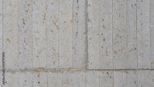 Weathered Concrete Wall Panels with Rust Stains and Natural Aging
