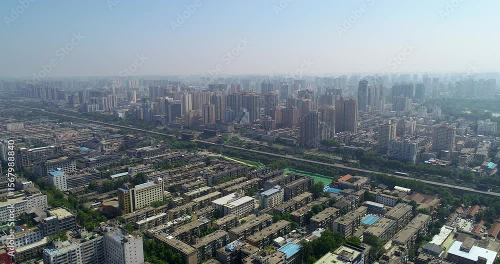 Stunning aerial view of ancient city wall in Xian City Shaanxi Province with modern skyline Stunning aerial view of ancient city wall in Xian City Shaanxi Province with modern skyline