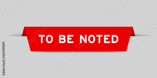 Red color inserted label with word to be noted on gray background