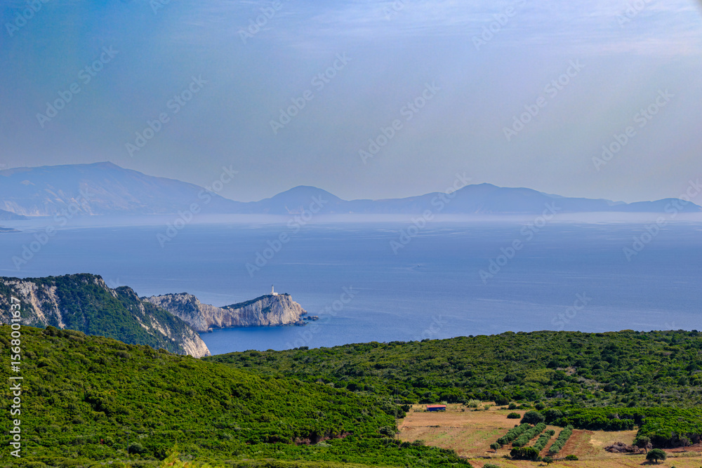 Fototapeta premium Scenic View of Cape Lefkada Lighthouse and Ionian Sea from Afar, Greece