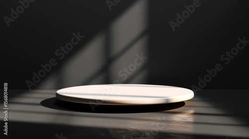 Minimalist cylindrical podium with soft shadows, creating serene atmosphere in dark setting. smooth surface invites focus and enhances overall aesthetic appeal