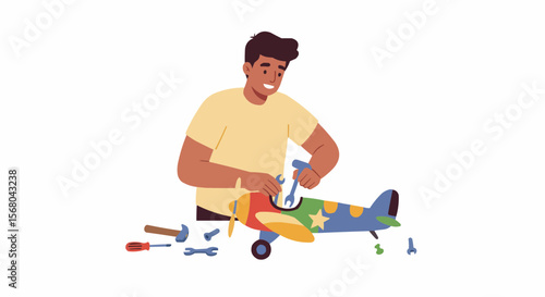 A man working on a toy plane.