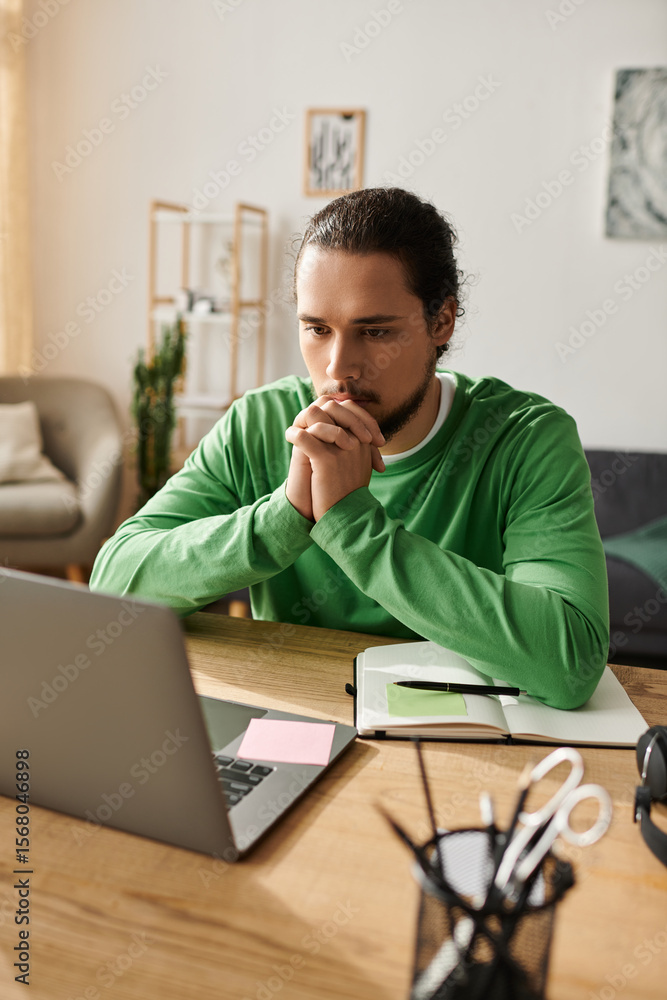 Focused young man engages in productive work at home surrounded by a calming atmosphere Focused young man engages in productive work at home surrounded by a calming atmosphere