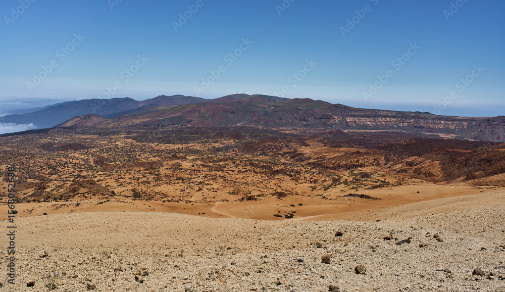 Fototapeta premium Caldera rim over lava fields