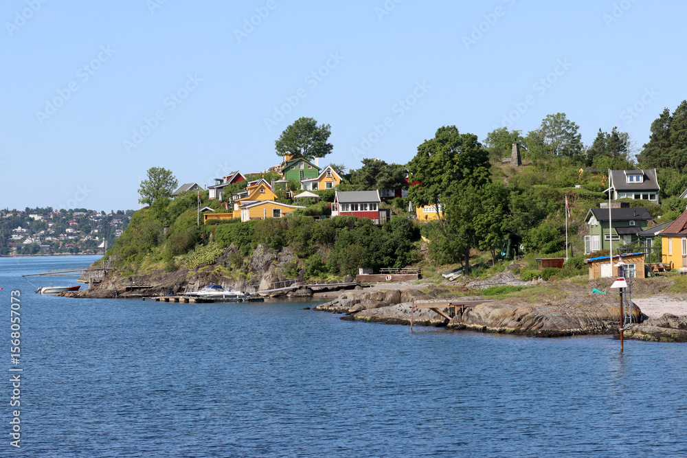 Naklejka premium Cottages on an island