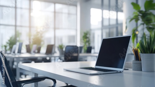 Wallpaper Mural Modern office workspace with sleek desks, laptops and digital screens Torontodigital.ca
