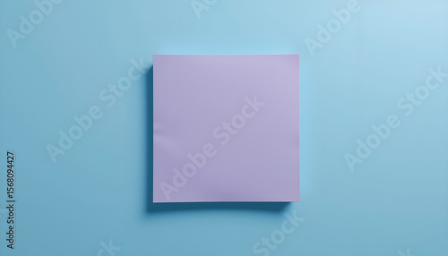 Purple Sticky Note on Blue Minimalist Background

