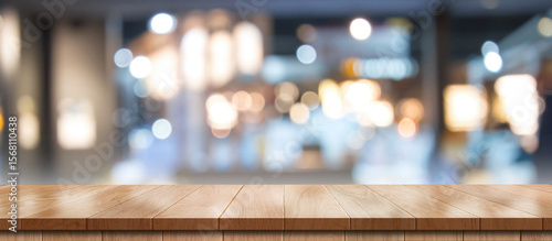 Foto Empty wooden table with bokeh light effect and blur restaurant background, for your photo montage or product display, Space for placing items on the table, product and food display