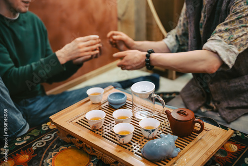 Tea Master Sharing Tea During Traditional Ceremony