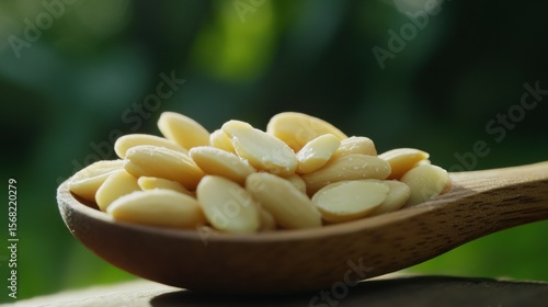 Blanched Almonds in Wooden Spoon, Healthy Snack